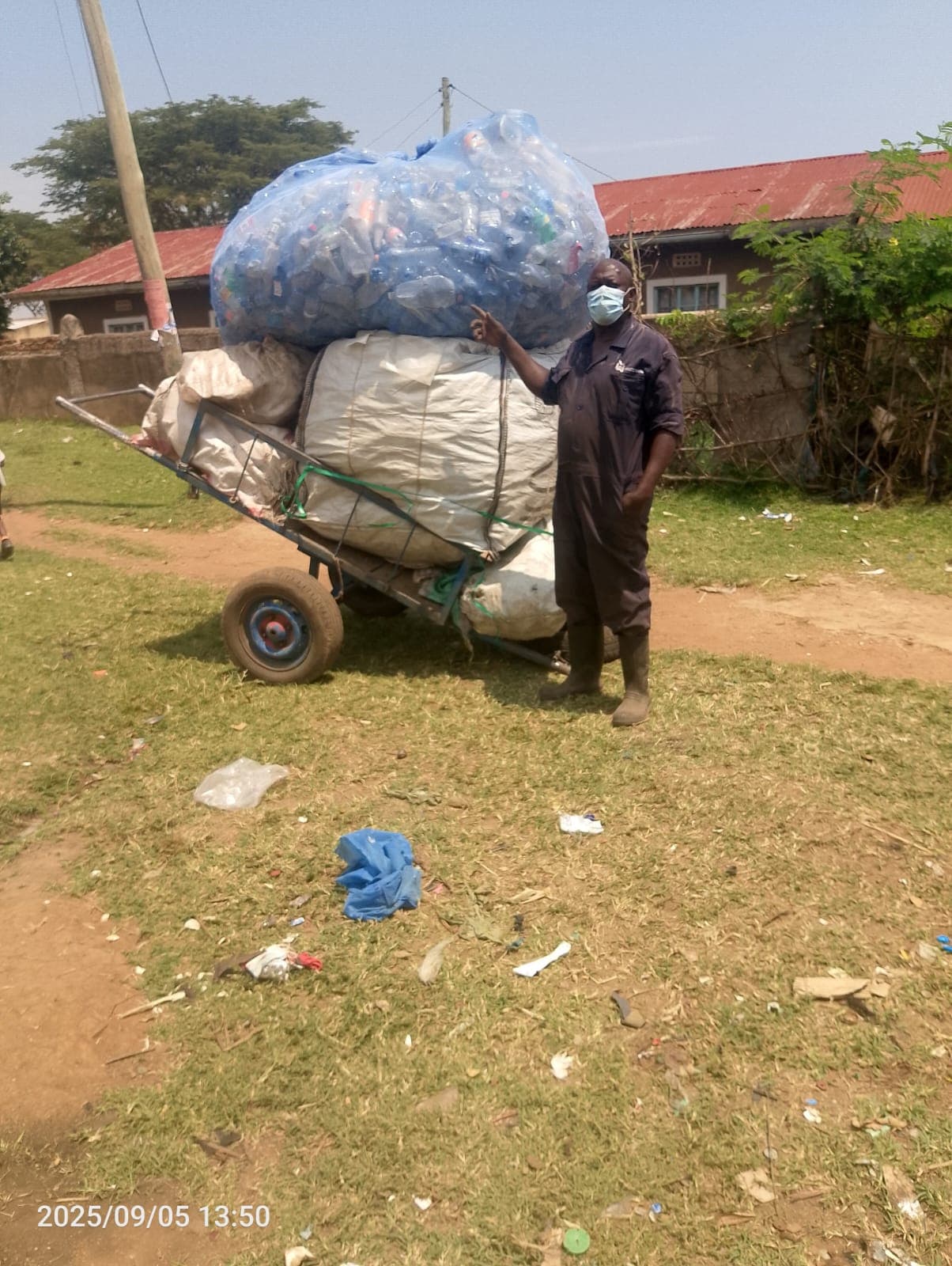 A waste Collector delivering plastic waste to Safisha Nchi's Buyback Center